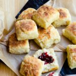 Biscuits on brown parchment paper on slate.