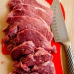 Beef round sliced into ½-inch slices for beef carbonnade.