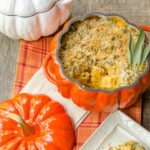 Pumpkin mac and cheese in a cast iron pumpkin shaped pot.