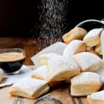 air-fried beignets with an espresso and powdered sugar raining down on them.