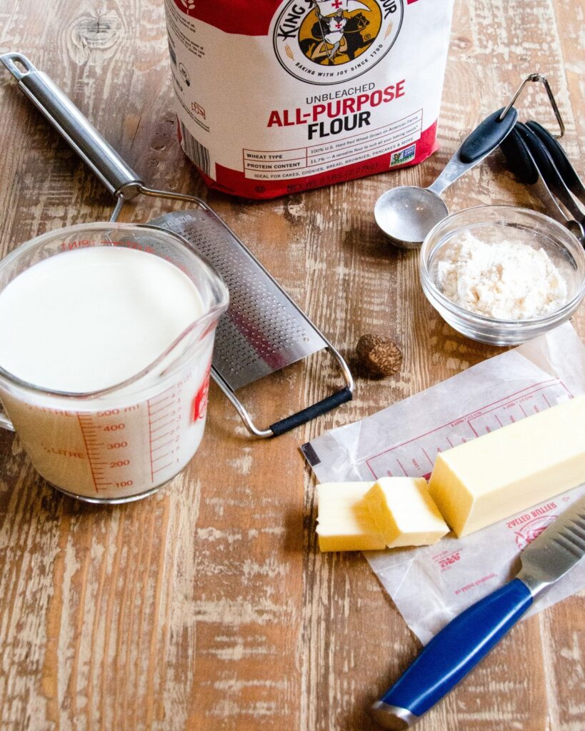 Ingredients for Bechamel sauce: milk, butter, flour and nutmeg.
