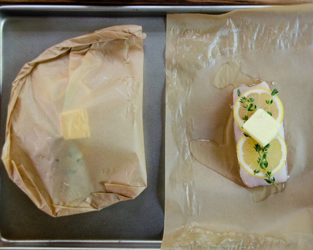 Halibut en papillote - one assembled and one ready to fold.