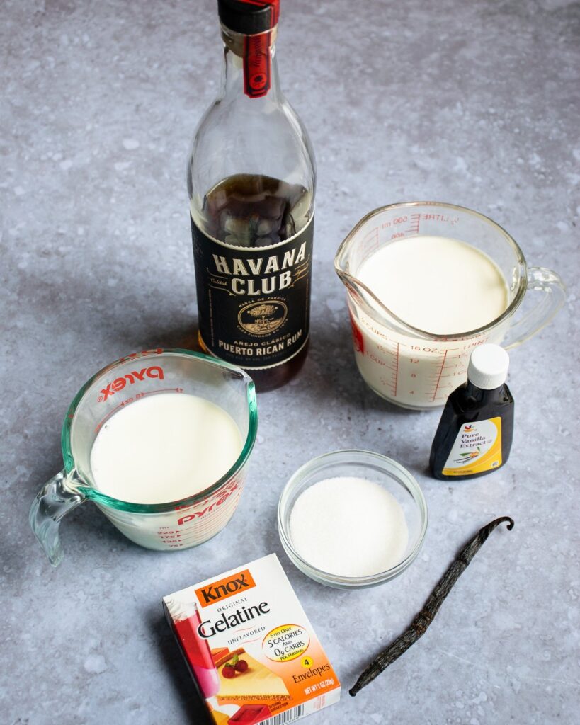 Ingredients for panna cotta - cream, milk, sugar, vanilla, gelatin and rum.