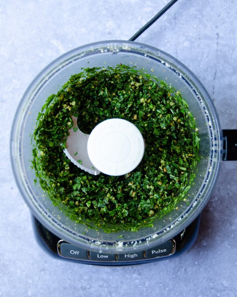 Basil, garlic, Parmesan cheese and pine nuts blended in a food processor