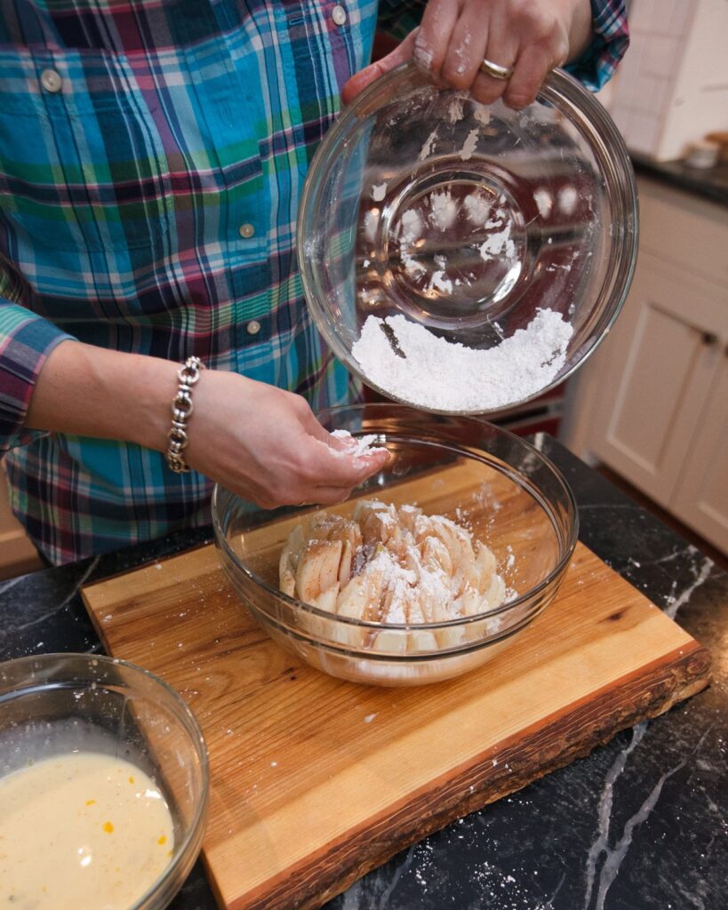 Dredging an onion for a second time - a step in making a Blooming Onion.