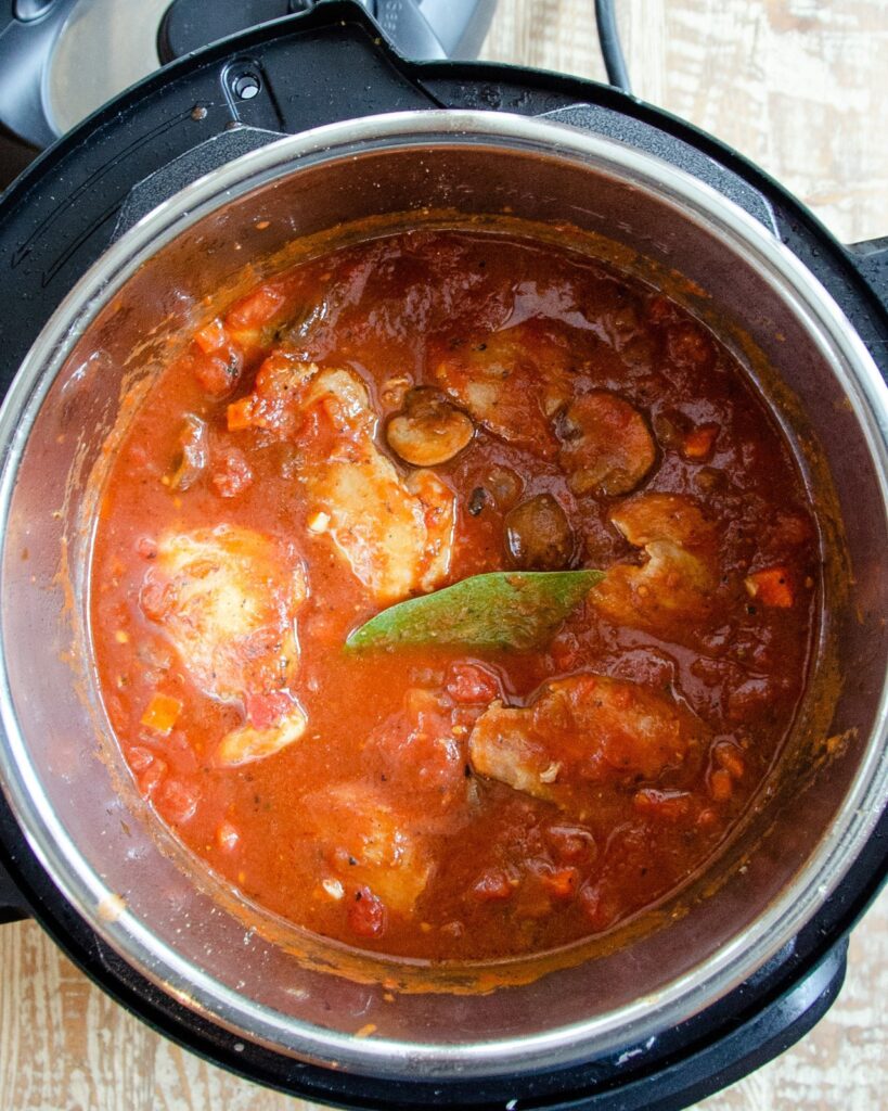 Chicken, tomatoes and mushrooms in  an Instant Pot® 