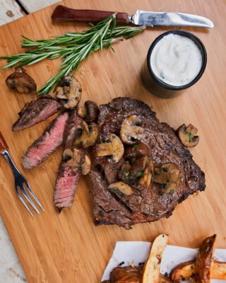 Marinated Rib Eye Steak with Herb Roasted Mushrooms