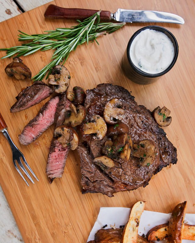 Marinated Rib Eye Steak with Herb Roasted Mushrooms