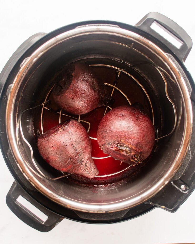 Cooked beets in a pressure cooker.