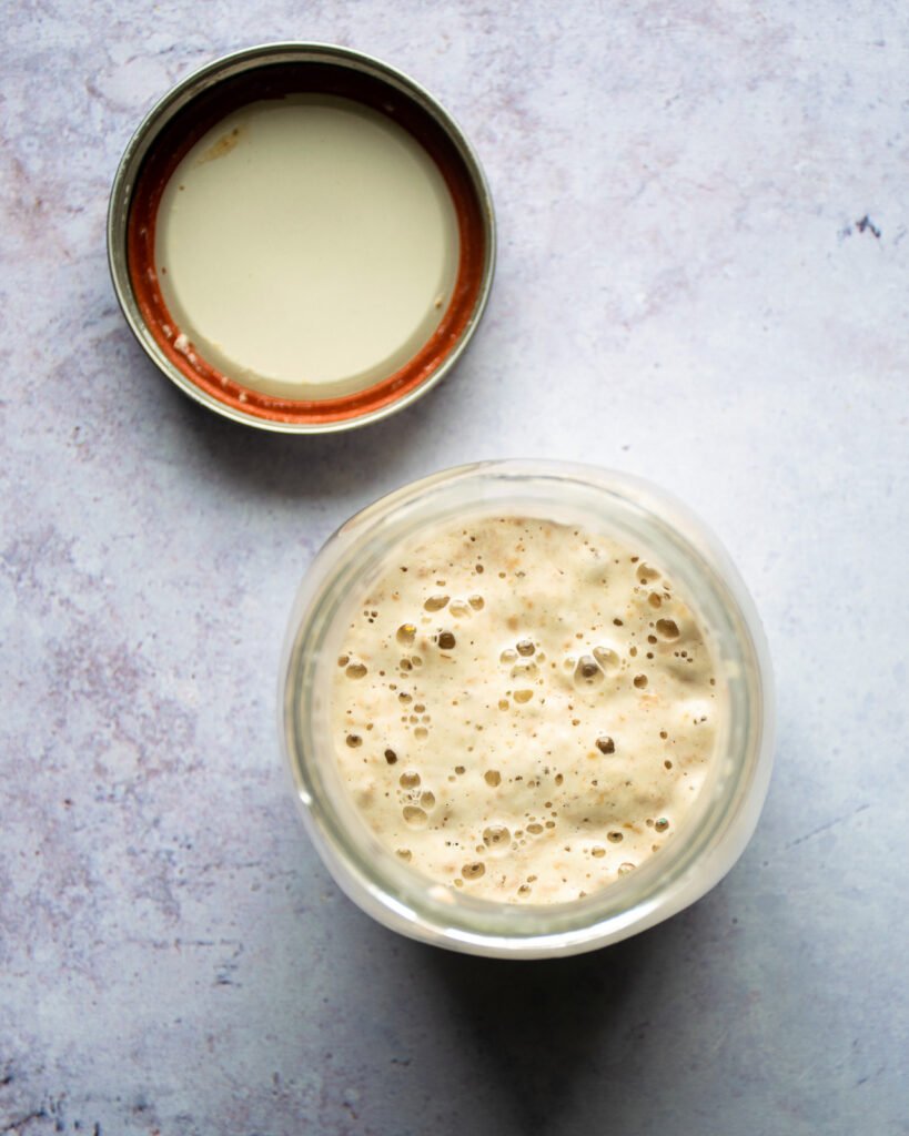 An overhead shot looking down into a jar of sourdough starter.