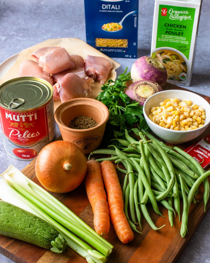 Vegetables and other ingredients on a cutting board.
