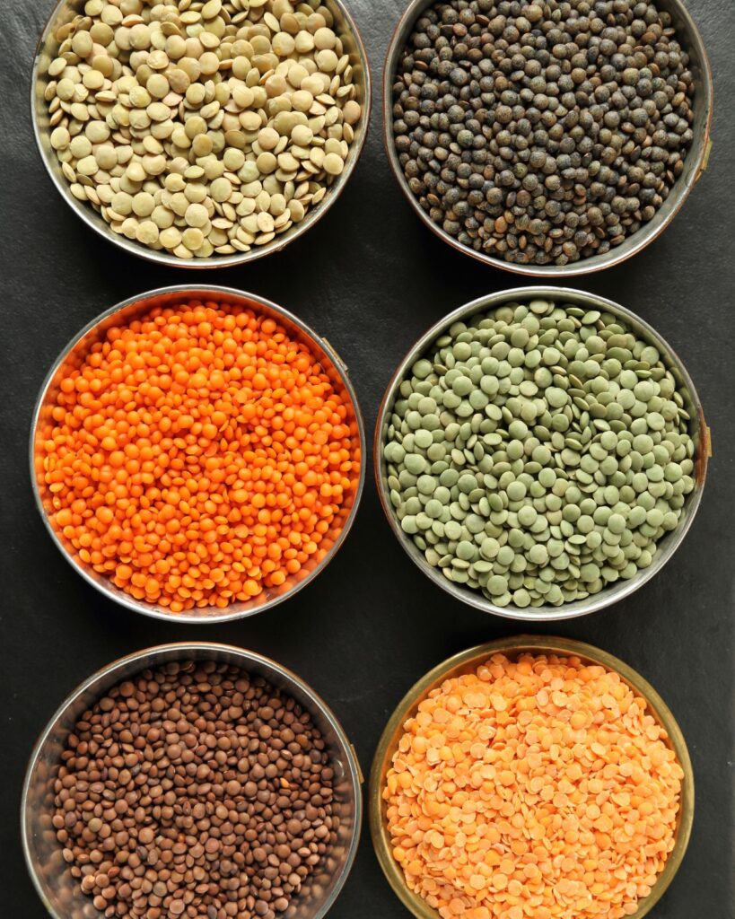 Six dishes with different lentils - green, brown, red, yellow, de Puy.